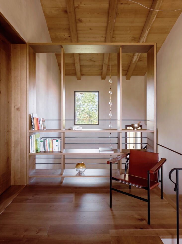 Interior living space showcasing the use of local chestnut wood and Luserna stone