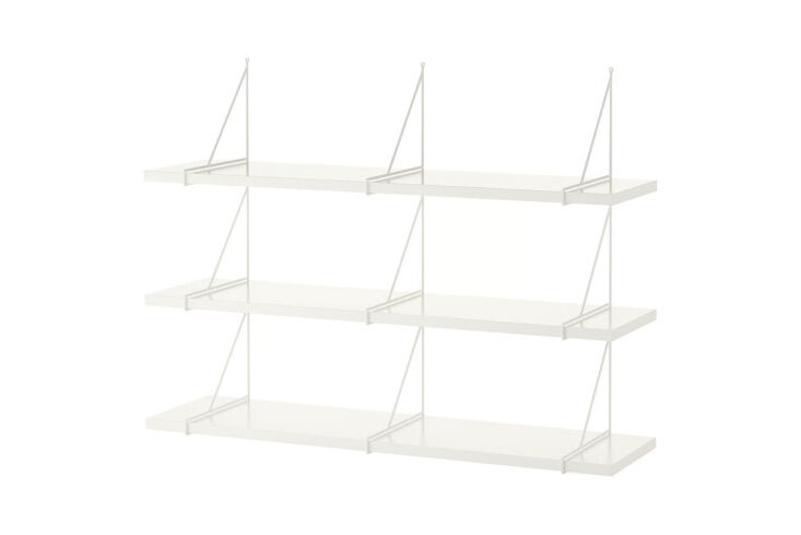 IKEA Bergshult/Pershult wall shelves with white brackets and clean wooden boards.