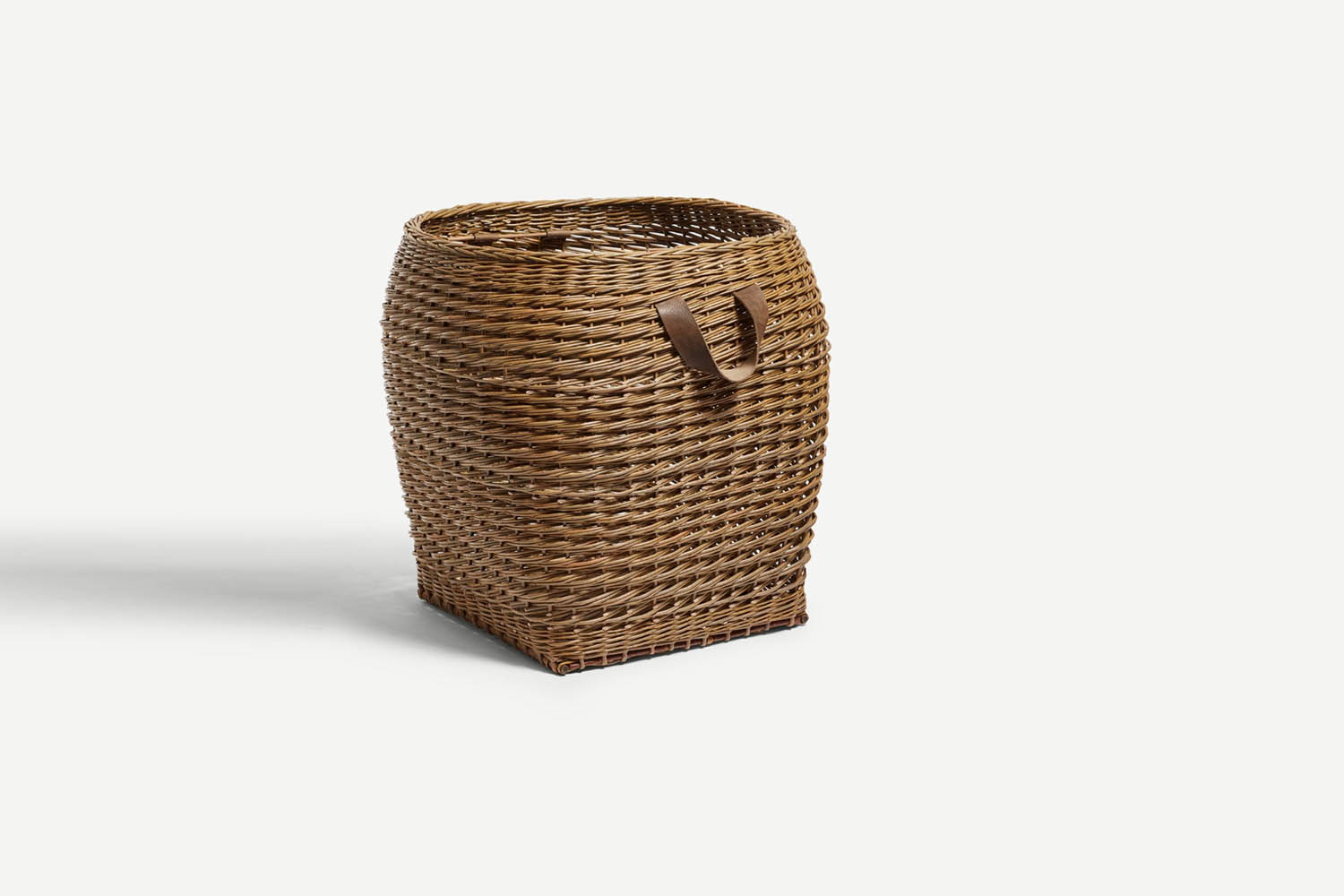 A handcrafted willow log basket by Annemarie O'Sullivan.