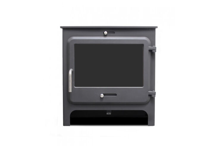 A compact Ekol Clarity Vision wood-burning stove installed in a minimalist interior.