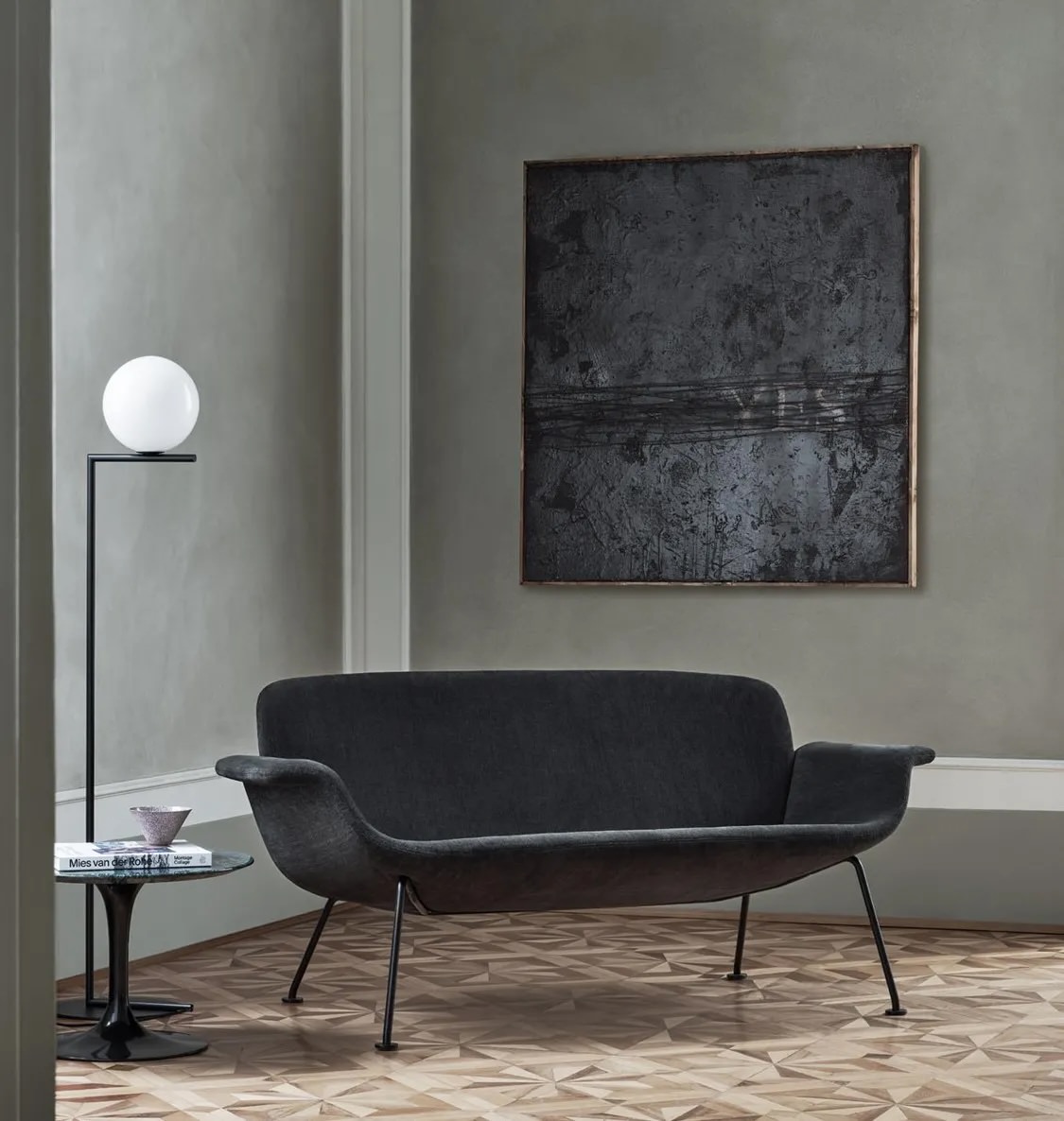 A low-profile KN Collection settee designed by Piero Lissoni in a minimalist living room.