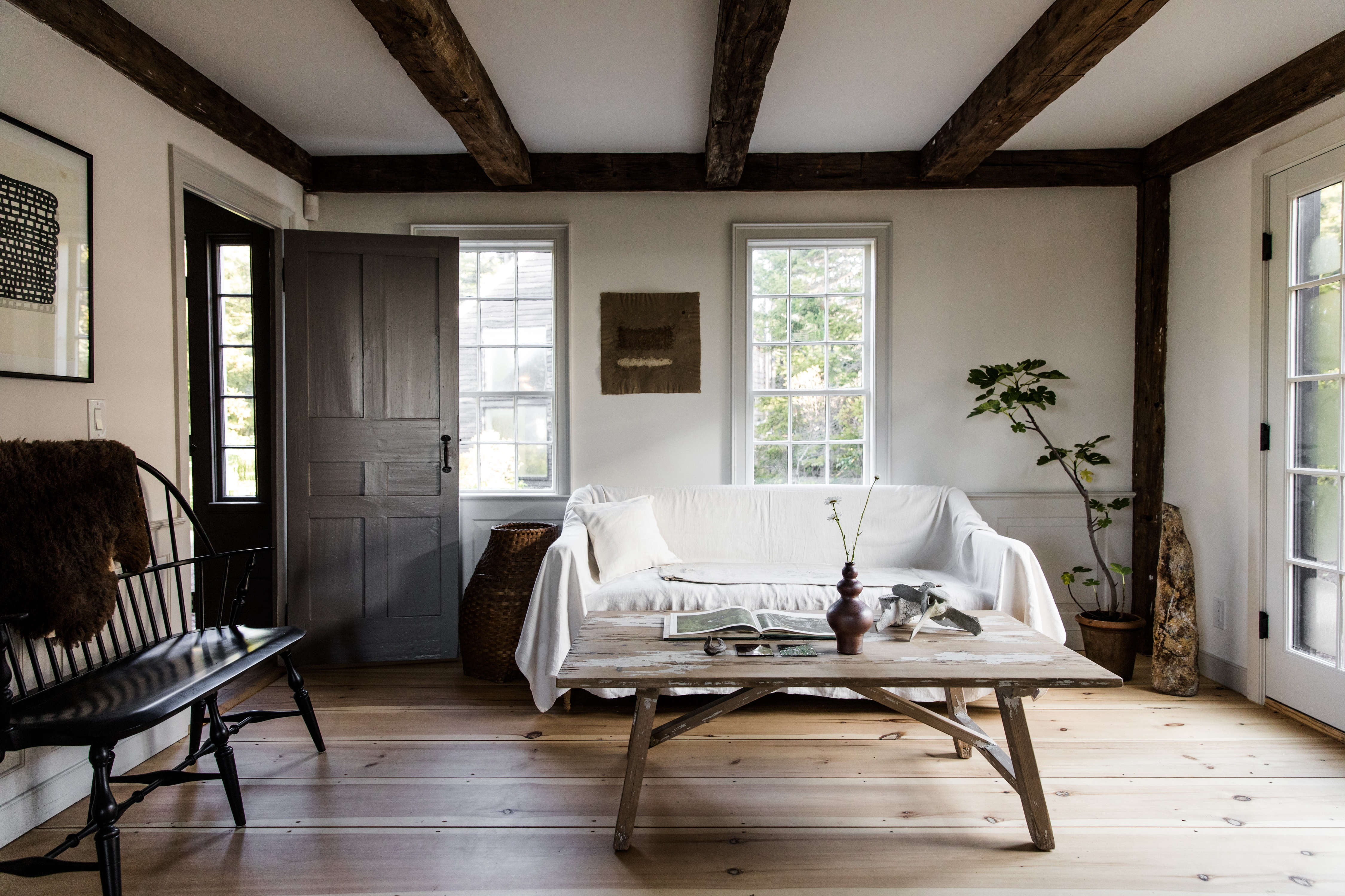 Close-up of original wide plank wooden flooring in a historic Maine home.