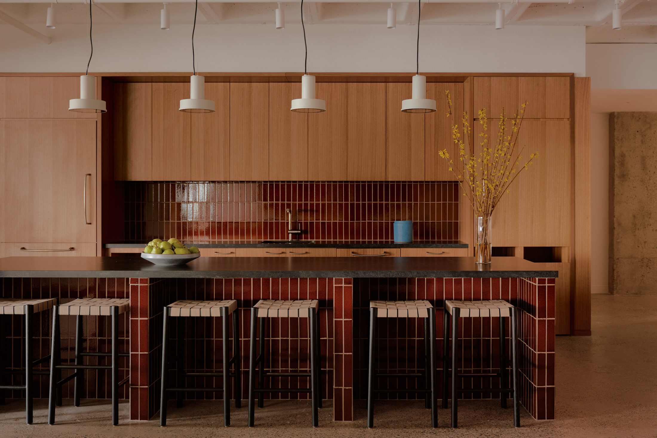 A small, tech-minimalist focus room or escape pod for quiet work.