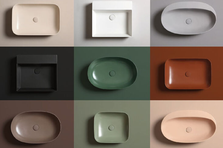 Two Azzurra Ceramica Forma sinks featuring a deep, saturated emerald green finish.