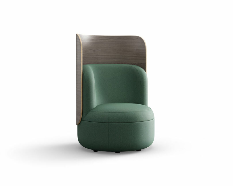 A green upholstered Dotti chair featuring a tall, curved European ash wood back panel.