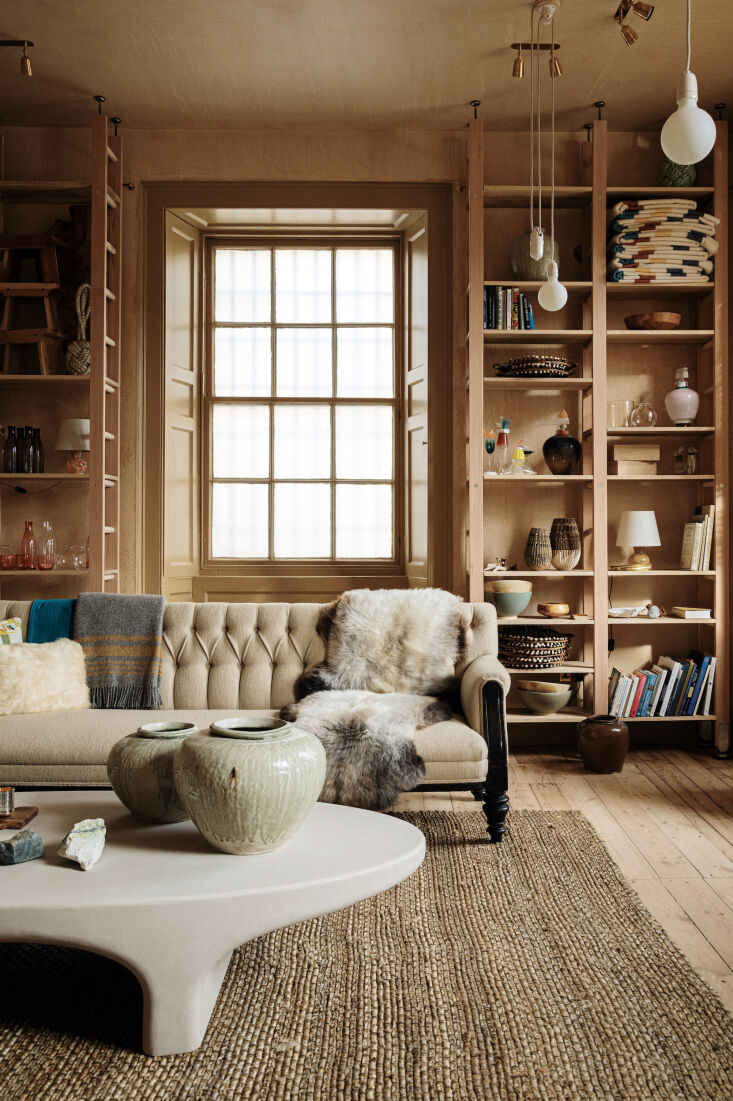 A wide shot of a curated room in Bard styled as a collector's living space with modern Scottish wares.