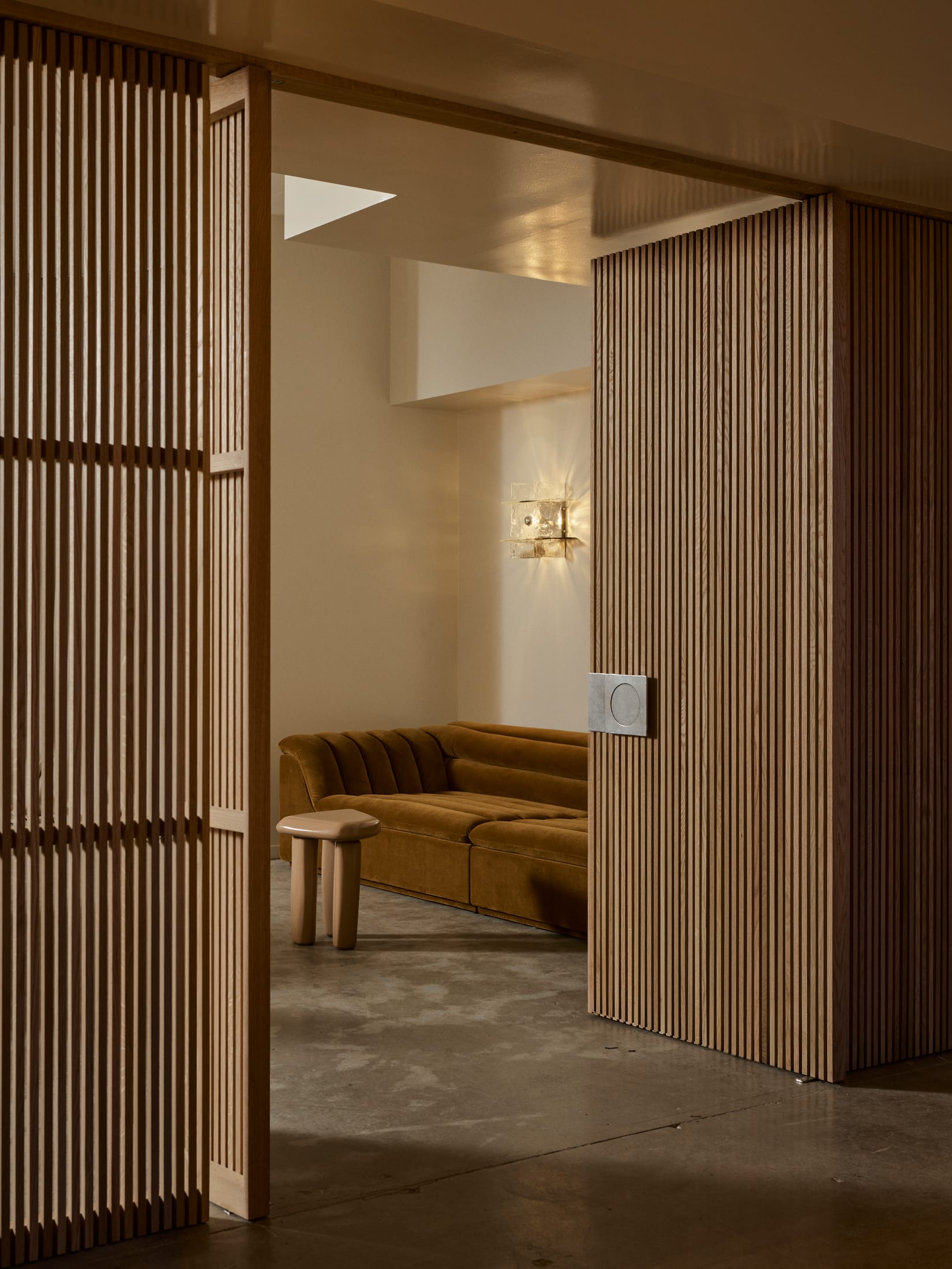 The upstairs Designer Suite at Ellison Studios featuring curated furniture arrangements.