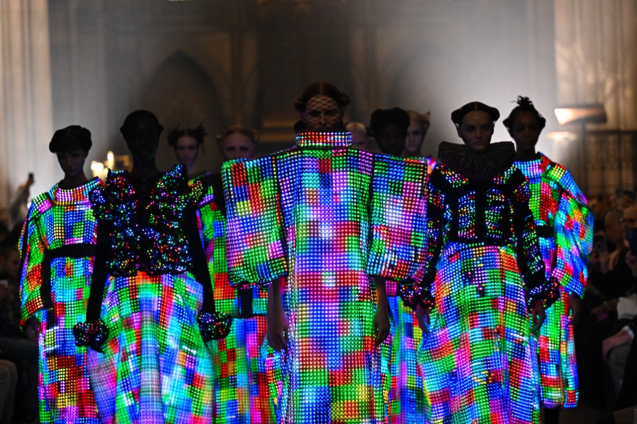 Collage style graphic with the text 'Take 5: Pixelated Fashion, Pop-Up Lamps, + More'.
