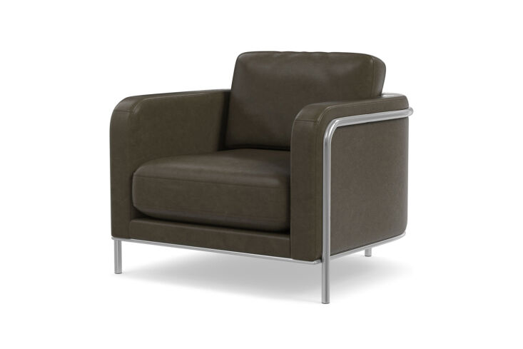 The West Elm Nina Leather Chair showing a minimalist curved metal frame and a thin, elegant leather seat.