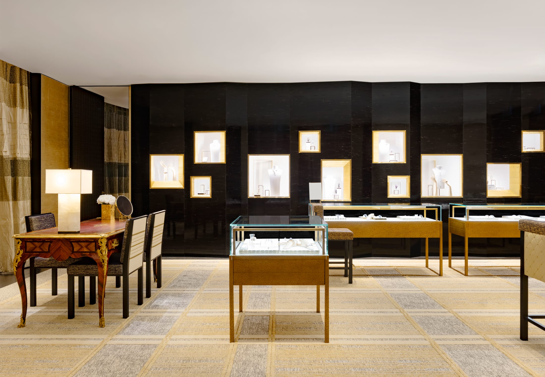 Art installation on the wall of the Chanel boutique featuring modern curated pieces.