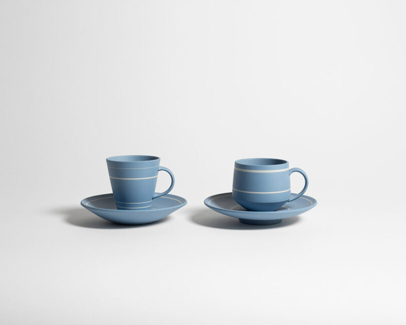 Studio shot of two light blue ceramic teacup sets on a clean white background.