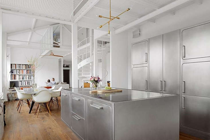 A Parisian loft kitchen with professional-standard Abimis stainless steel components.