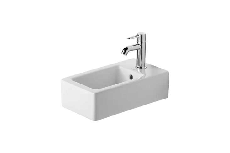 A sharp-edged, modern rectangular ceramic handrinse basin.