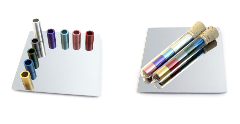 A travel-friendly magnetic menorah by Laura Cowan with movable candle holders.