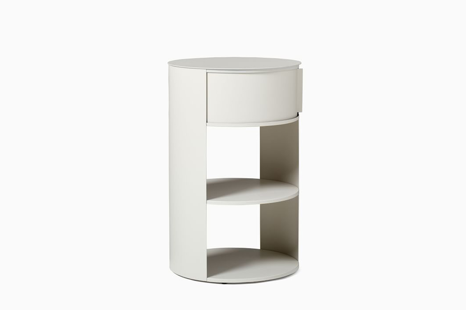 Minimalist white cylindrical nightstand with a drawer and two open storage shelves against a neutral wall.