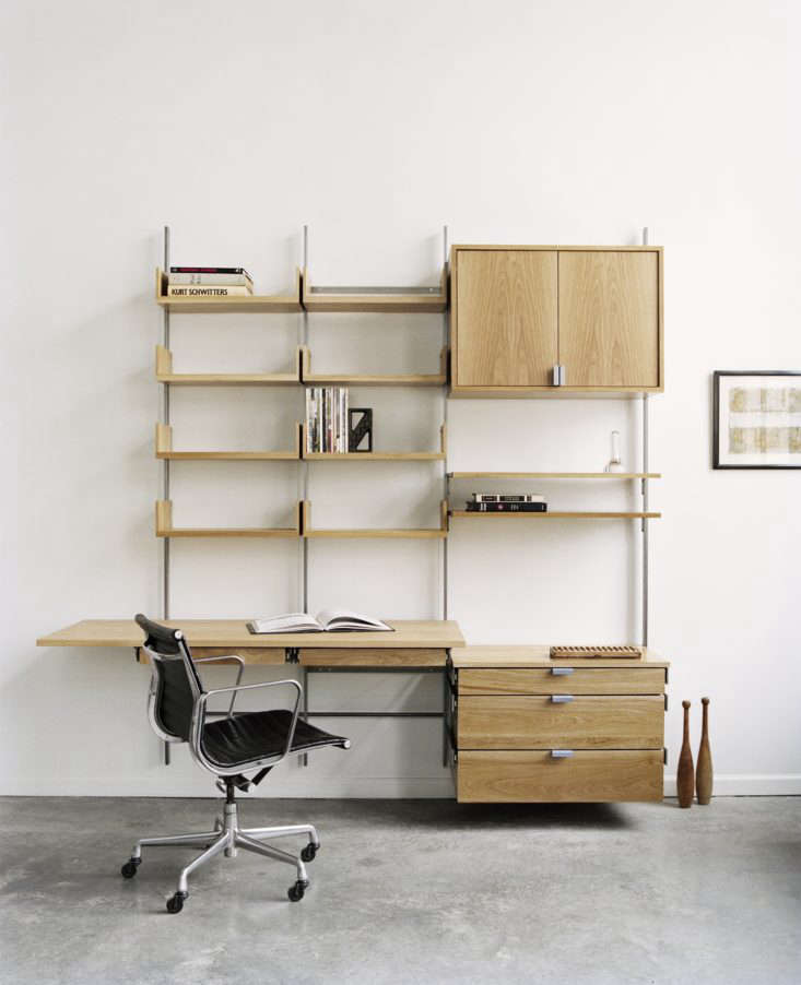 Atlas Industries as4 shelving system featuring custom wood finishes and steel vertical supports.