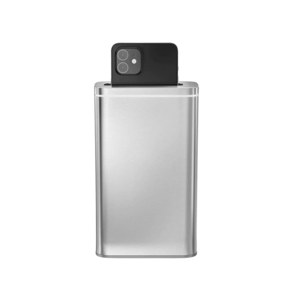 A utility closet organized with wooden-handled brooms and brass hooks.