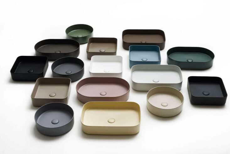 Thin-edged organic shaped bathroom basins in various soft matte colors.