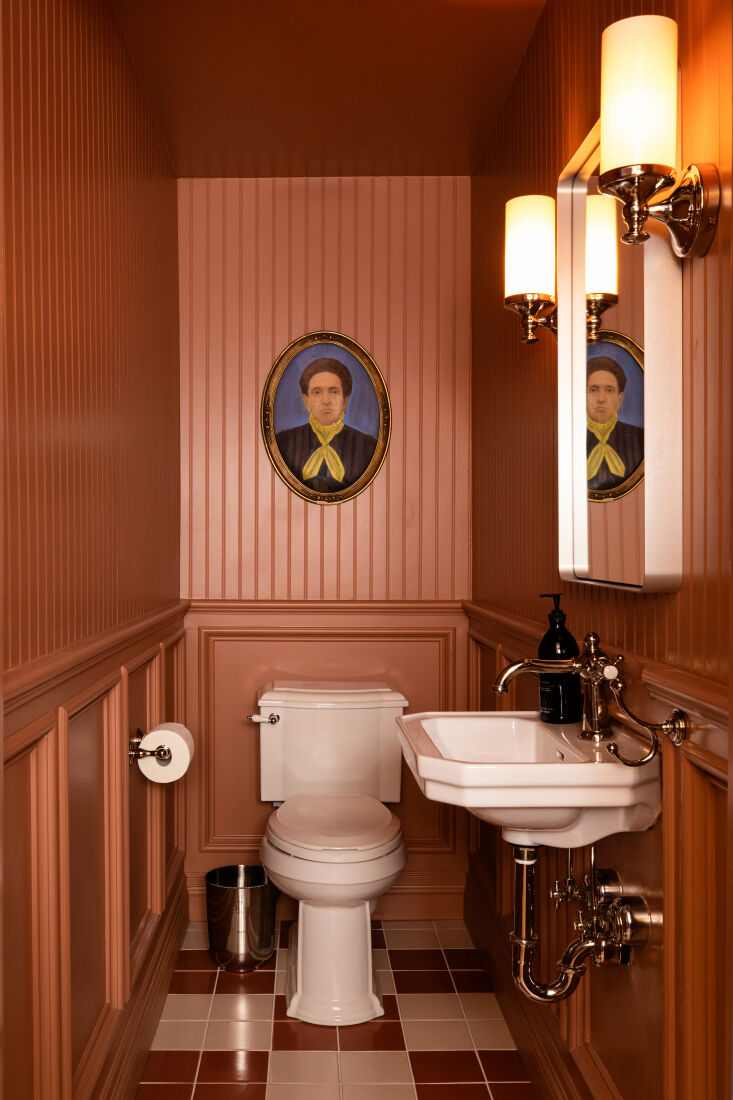 Small bathroom featuring a monochromatic salmon pink color scheme from floor to ceiling.