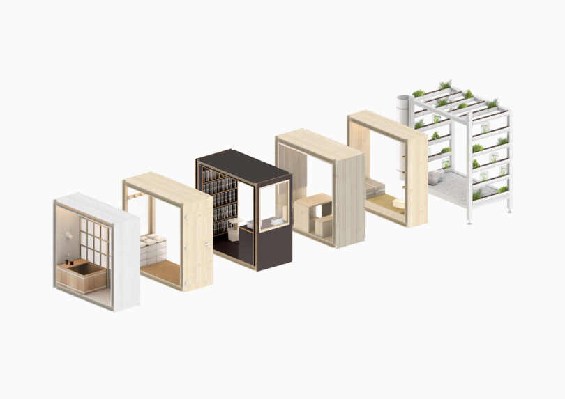 A row of modular wooden and metal room units displaying different interior functions.