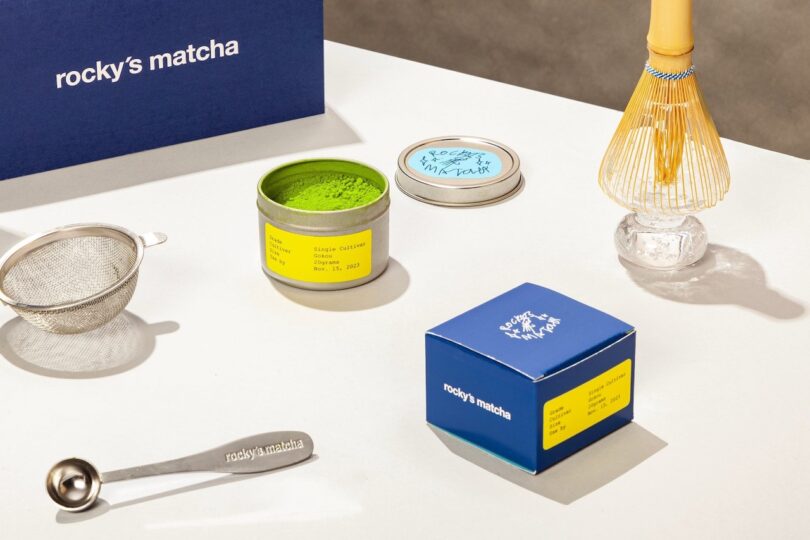 Traditional matcha tea-making tools including a bamboo whisk and sifter.