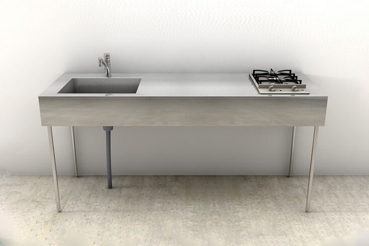 A compact Japanese Toolbox kitchen island with thin legs and a single gas burner.