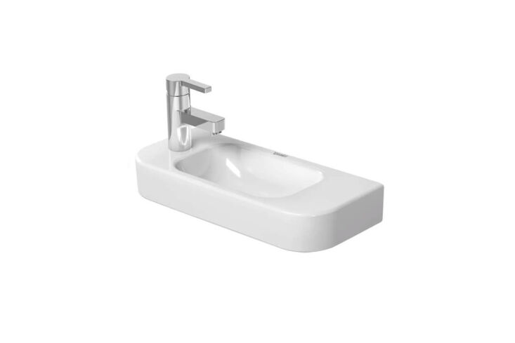 A long, narrow white ceramic wall-mounted sink.