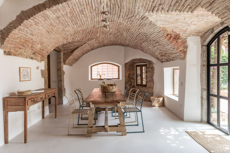 The exterior of a traditional stone farmhouse on the island of Mallorca.