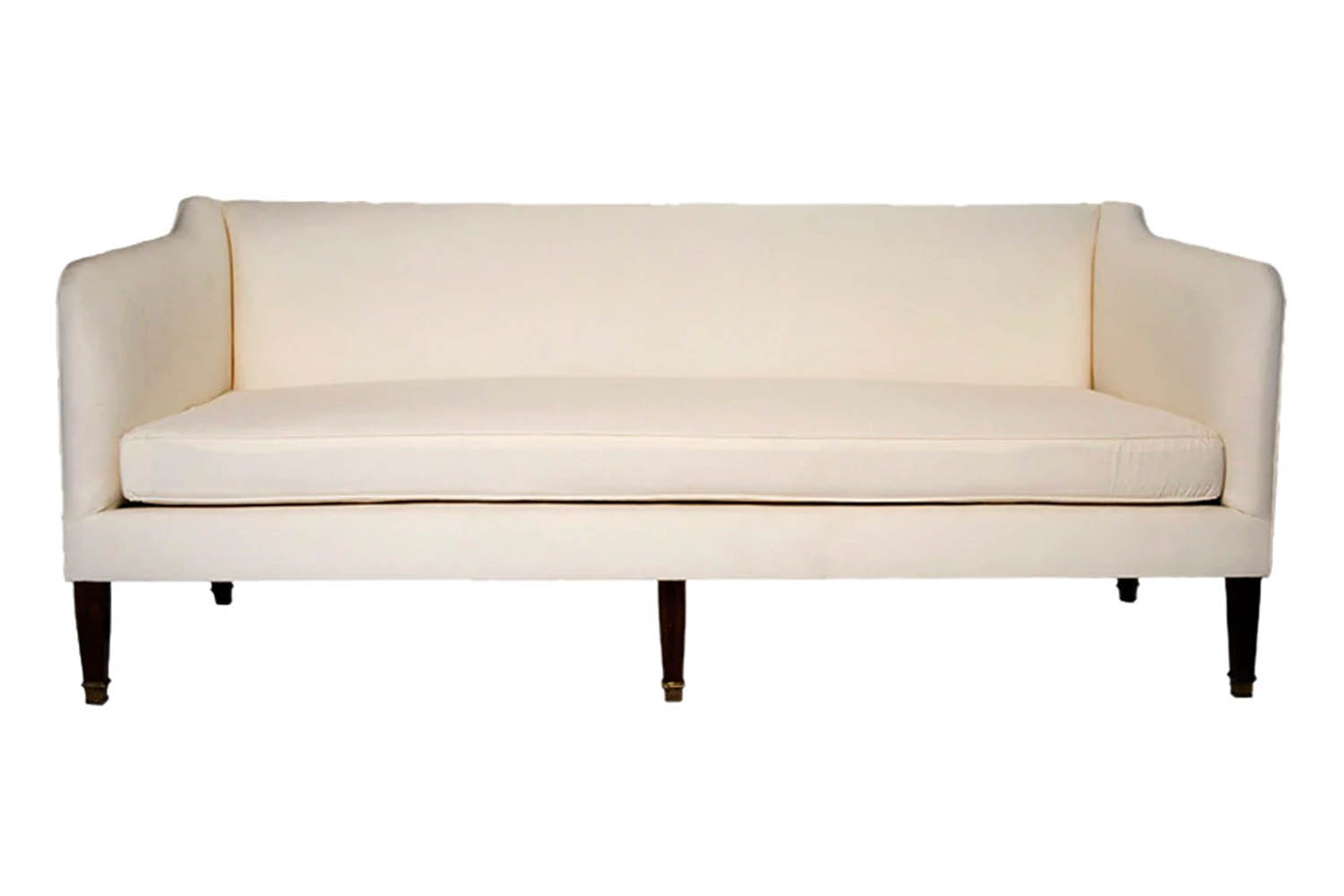 A John Derian Cove Sofa upholstered in light-colored Belgian linen.