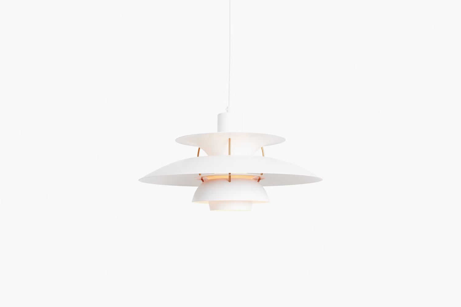 The iconic white PH5 Pendant Lamp by Poul Henningsen.