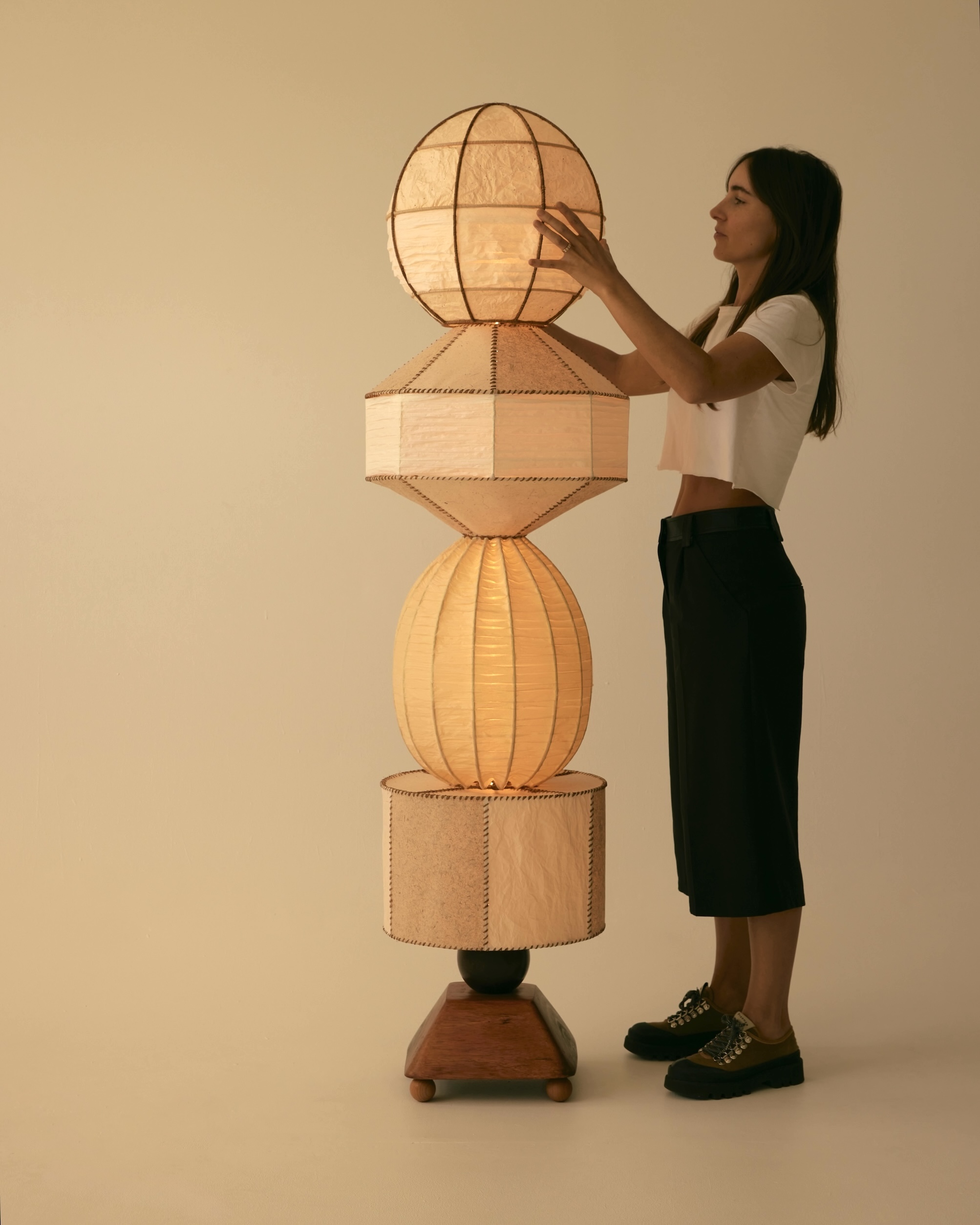 Modular Launay floor lamp with washi paper shades and wood pulp ribbon stitching.