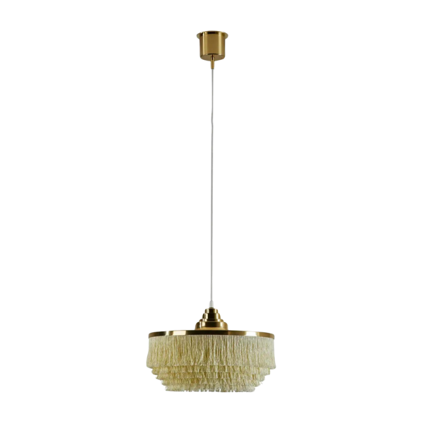 A long linear crystal pendant light hanging over a rectangular wooden dining table.