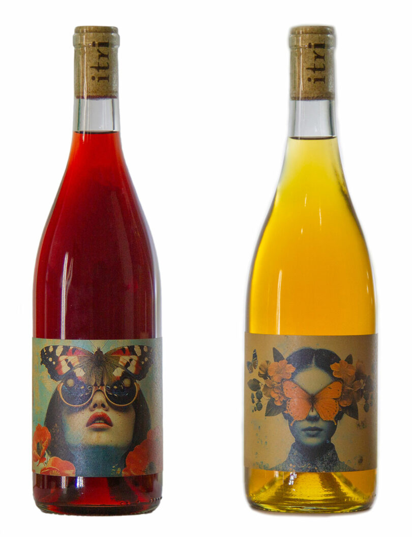 Two ITRI wine bottles with artistic labels featuring women's faces and butterfly designs.