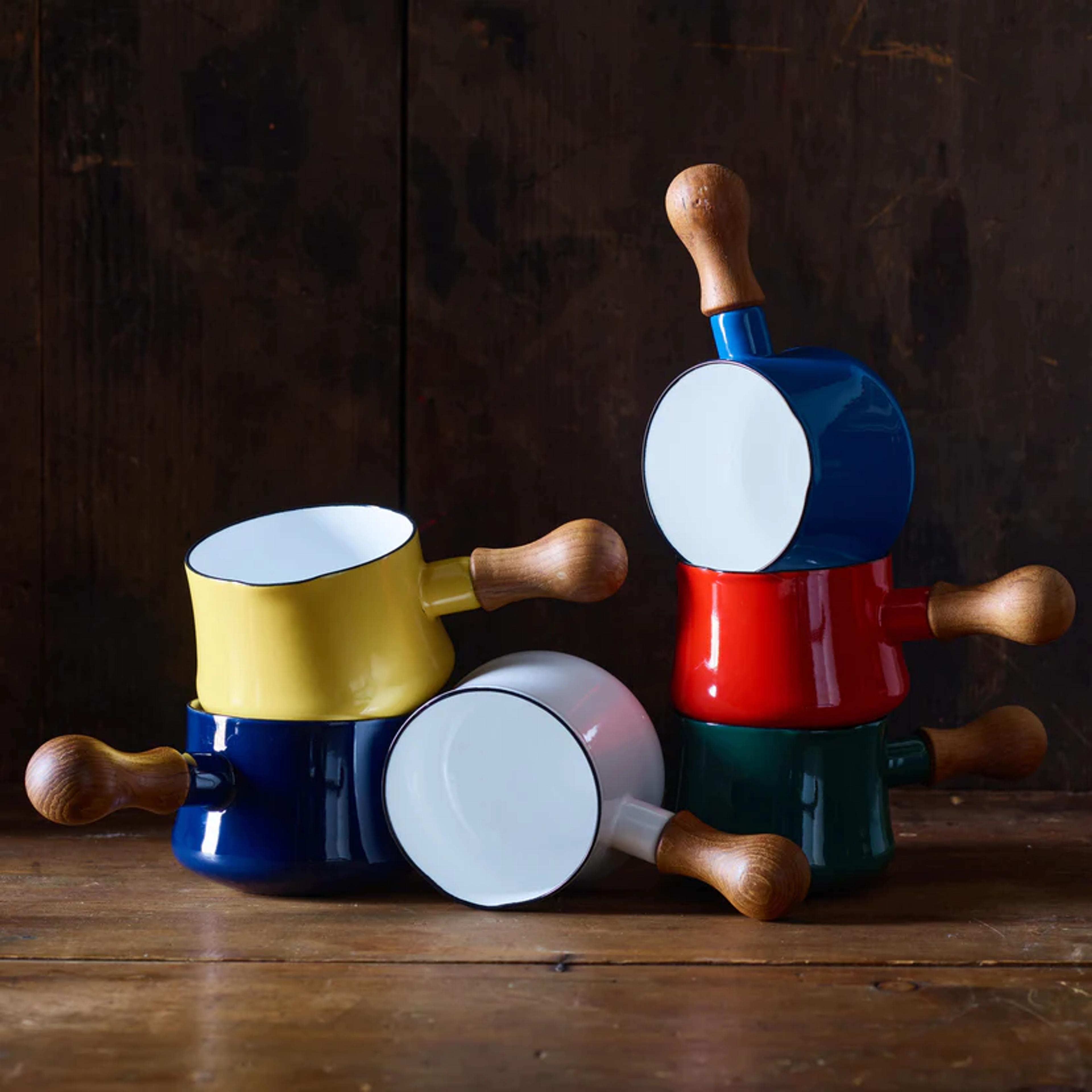 Dansk Kobenstyle butter warmers in vibrant enamel finishes.
