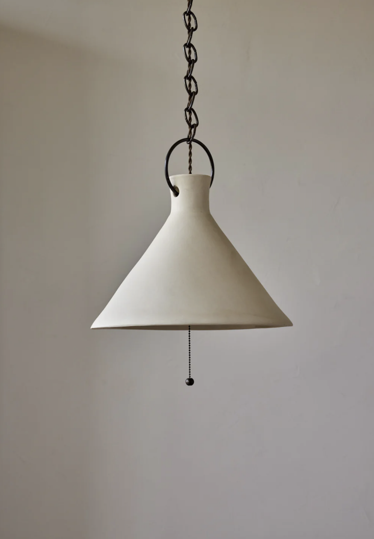 A Sand colorway ceramic pendant light made of white stoneware clay.