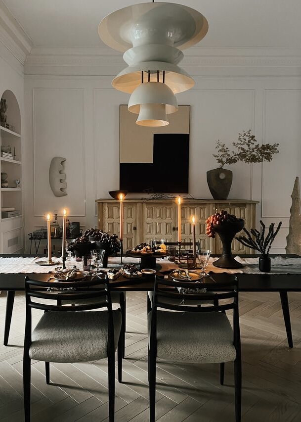 A collection of contemporary dining room light fixtures styled in a modern home environment.