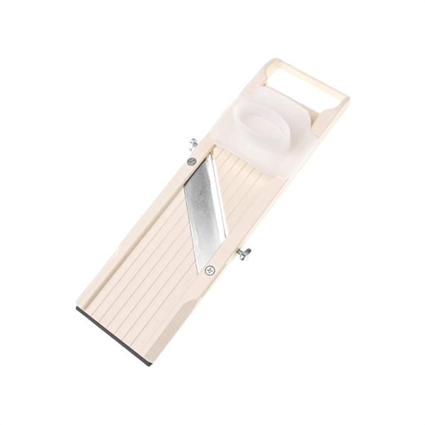 A spoon spreading a thick layer of white labne in a circular motion on a ceramic plate.