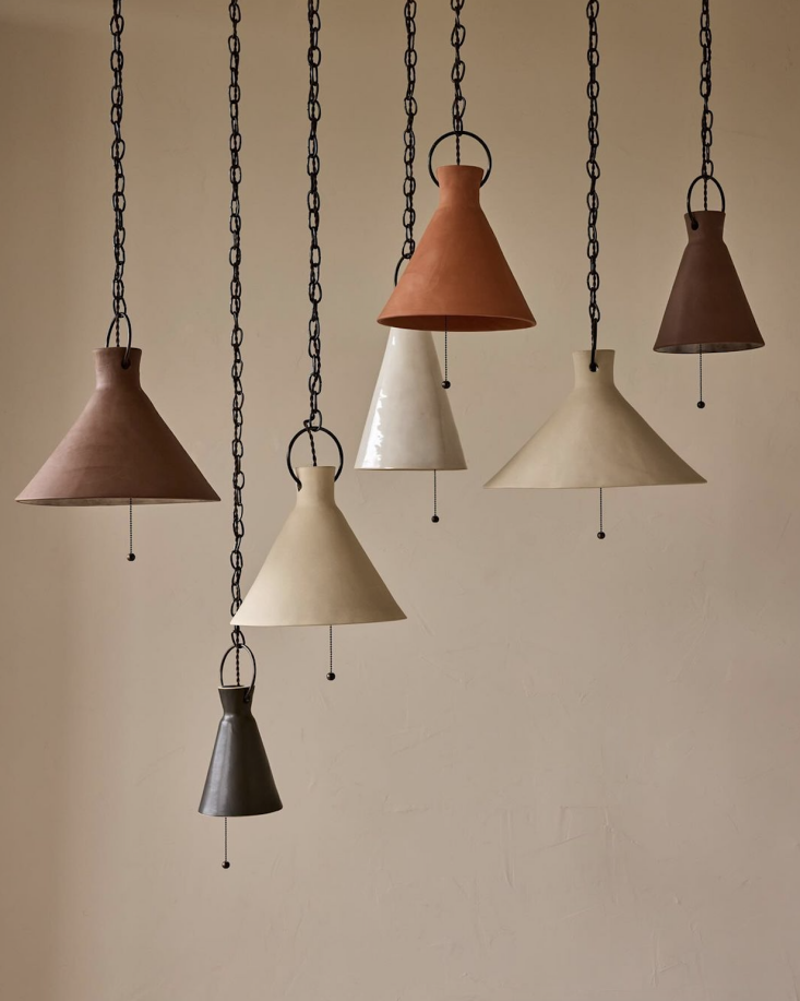 Four ceramic pendant lights in Mud, Pepper, Sand, and Salt finishes lined up horizontally.