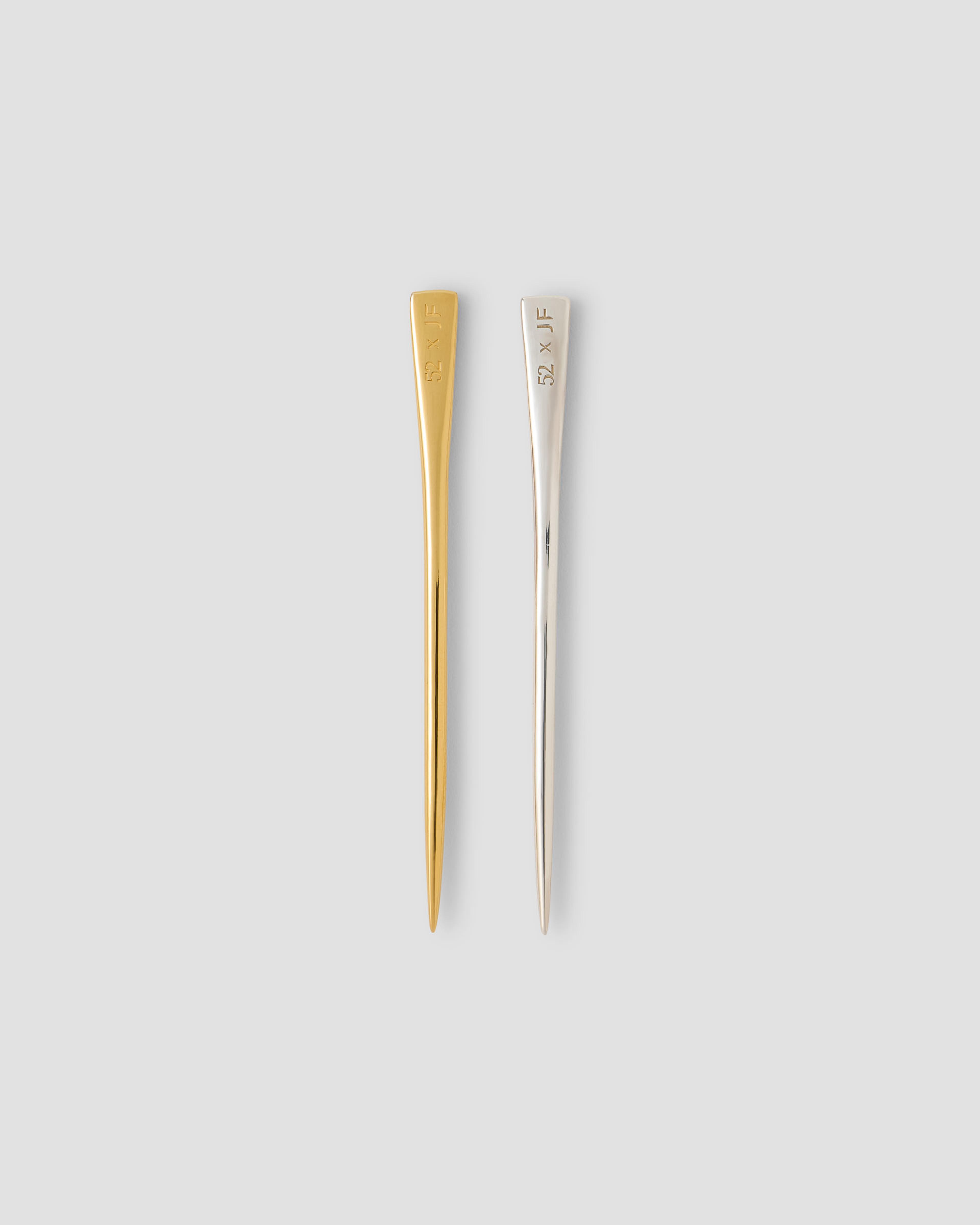 Side-by-side view of the sterling silver and 14k gold luxury toothpicks.