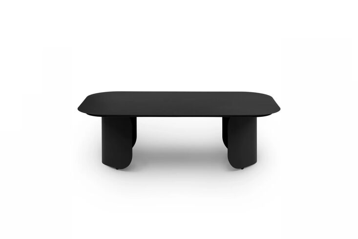 Sleek black metal coffee table by Article in a modern living room setting.