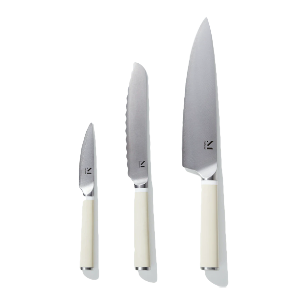 Black lentils simmering in a Dutch oven with aromatics and stock.