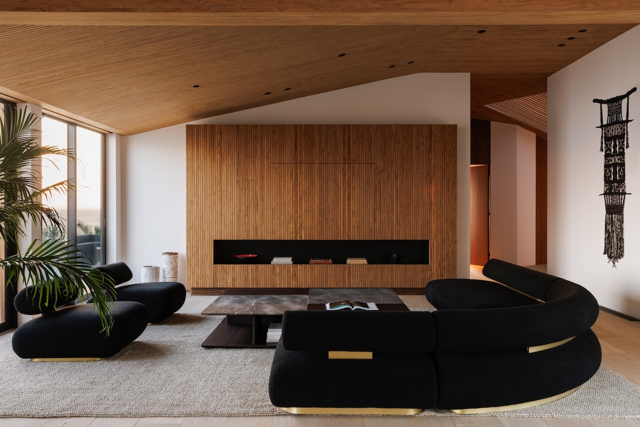 Close-up of the architectural design of the Malibu house showing wood wave structures.