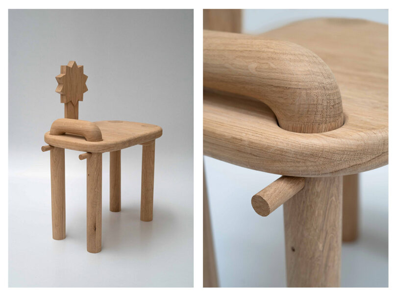 Close-up of a light-colored wooden chair with cylindrical legs and a sun-shaped detail on the backrest.