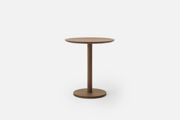 A minimalist wooden side table with clean lines.