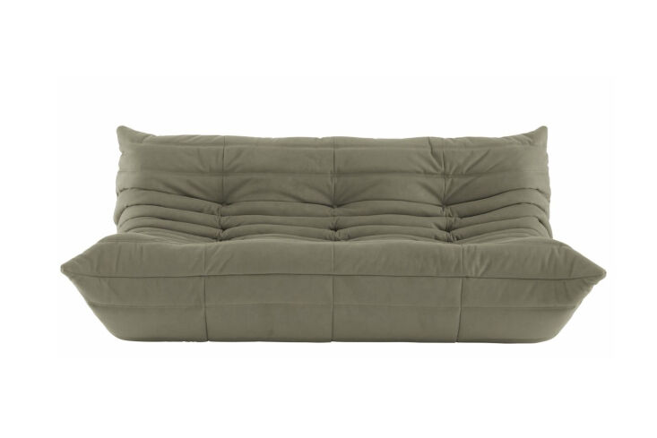 A Ligne Roset Togo Sofa in a minimalist room setting.