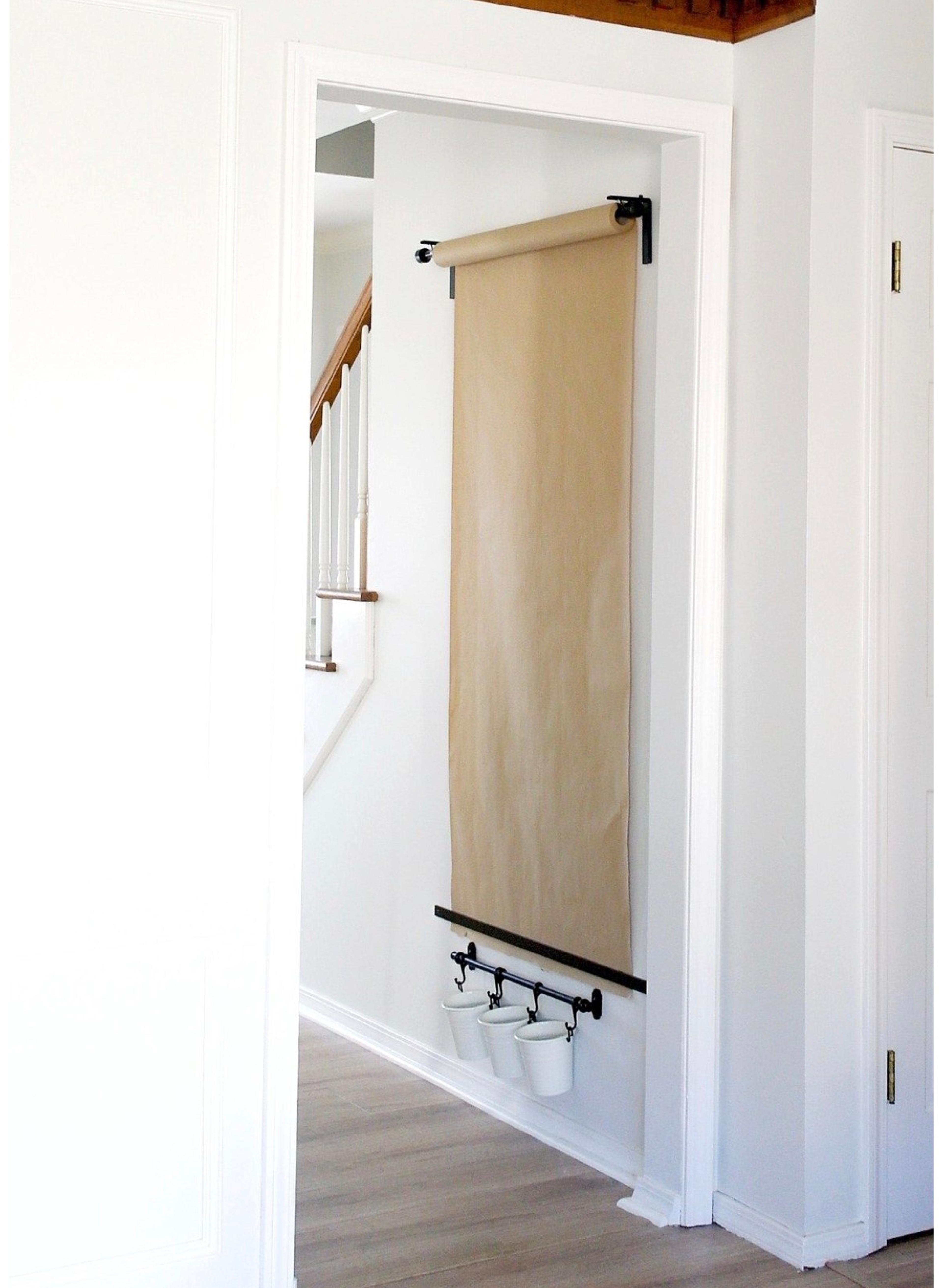 A close-up of the MÅLA drawing paper roll mounted and ready for use.