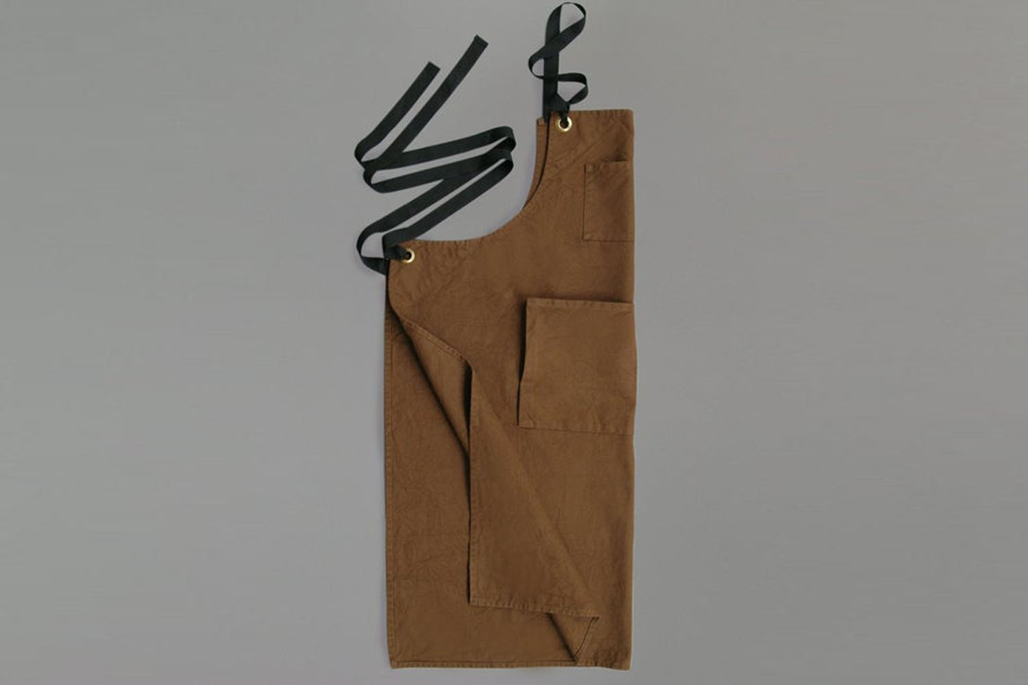 A graphic layout featuring various styles of utility aprons.