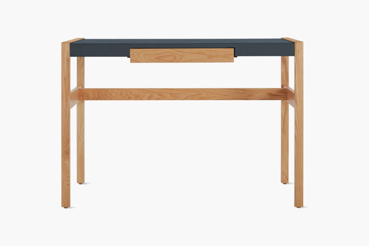 A Jens Risom oak desk with clean lines and a minimalist profile.
