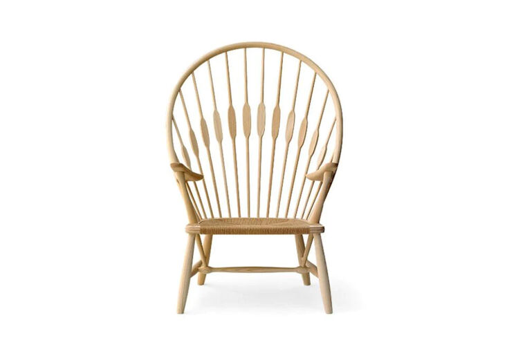 The iconic wooden Peacock Chair designed by Hans Wegner.