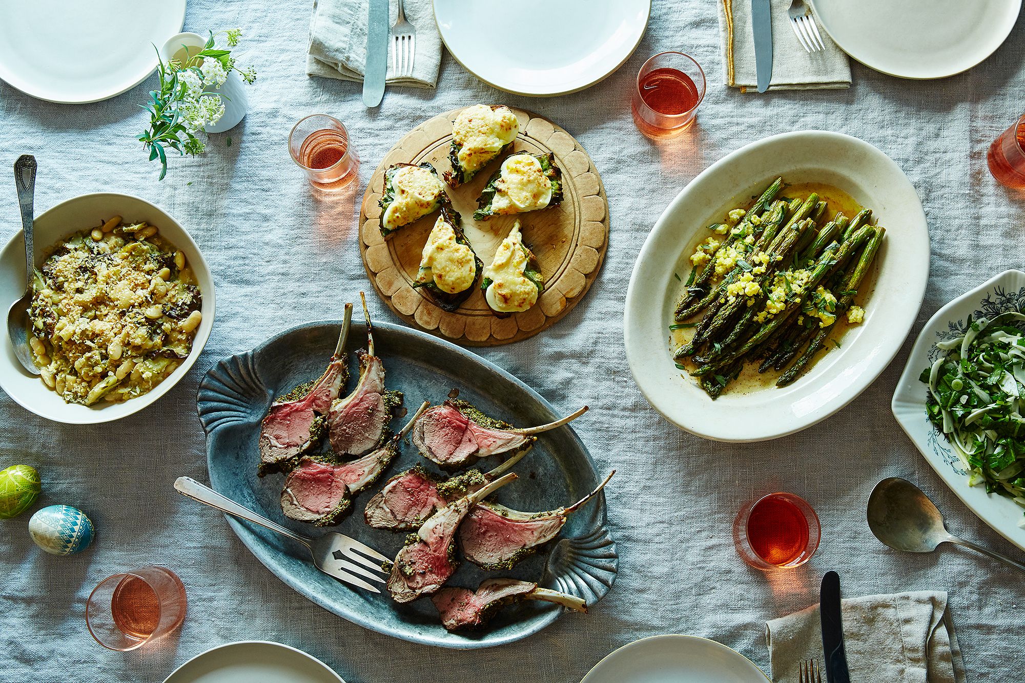 A beautifully curated Easter tablescape with linen runners and organic textures.